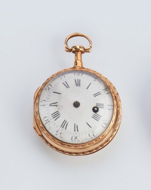 MONTRE DE POCHE type oignon en or uni 750