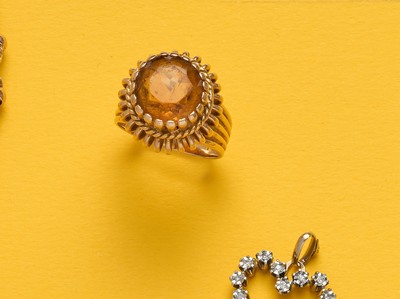 BAGUE en or (750) sertie d'une citrine. Panier...