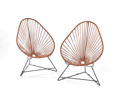 PAIRE DE FAUTEUILS type Acapulco à assise...