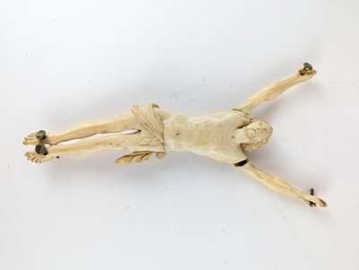 CHRIST en ivoire sculpté, la tête levée vers...