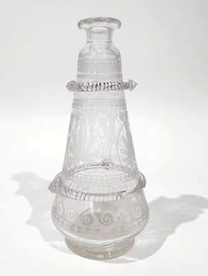 CARAFE en verre soufflé à décor sur la panse...