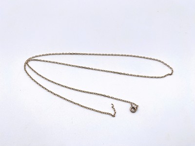 CHAÎNE en or (750) et son fermoir en métal...