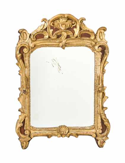MIROIR dans un cadre en bois sculpté ajouré...