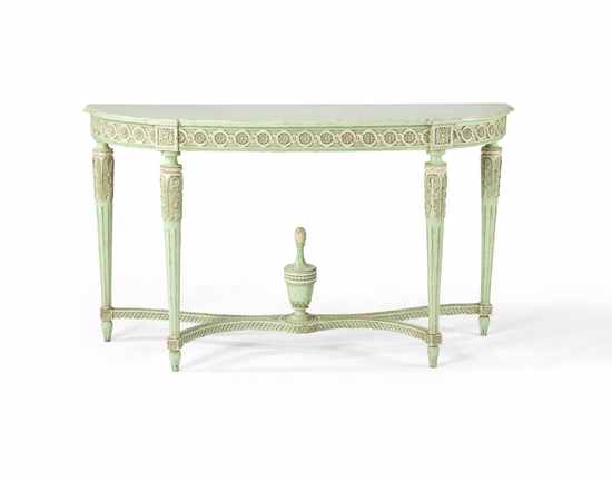 CONSOLE DEMI-LUNE en bois mouluré et sculpté...