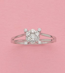 BAGUE en or gris (750) à chaton rond pavé...