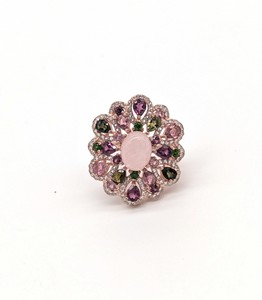 BAGUE en argent (925) rosé en motif de rosace...
