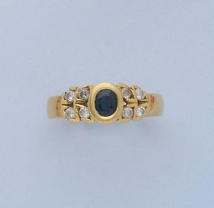 BAGUE jonc en or (750) avec saphir en serti...
